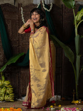 Ponvaani -  Gold Cotton Tissue Saree with Red & Gold Lace Border