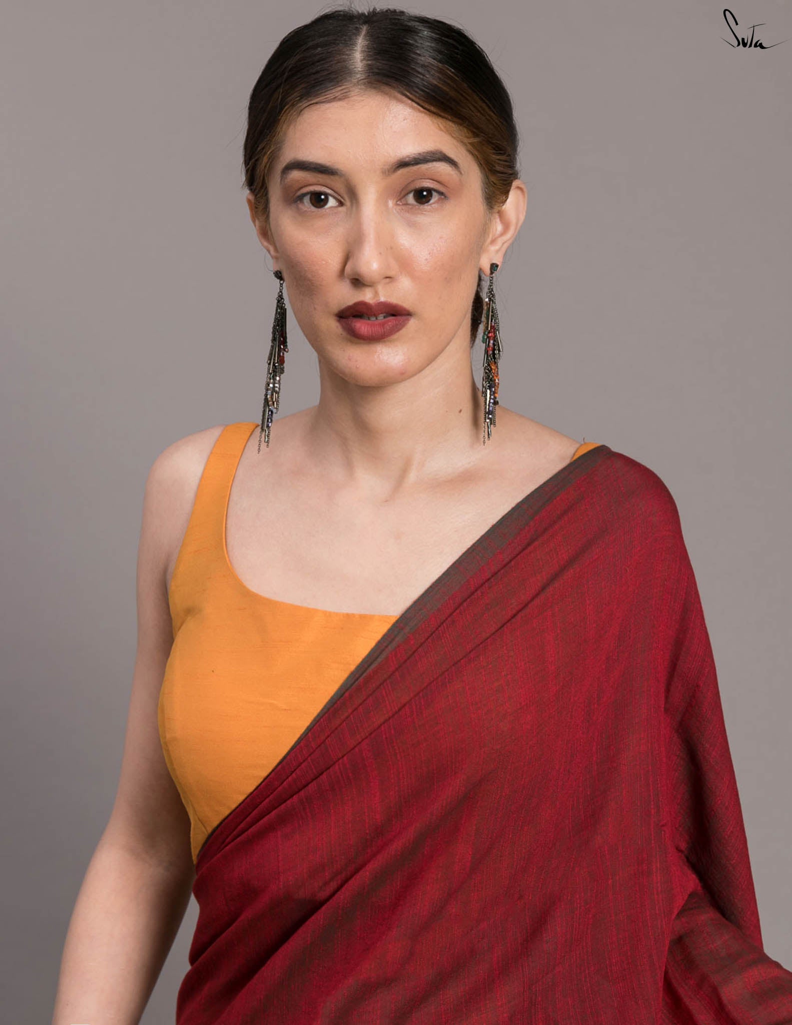 Suta Maroon Solid Cotton Blend Saree