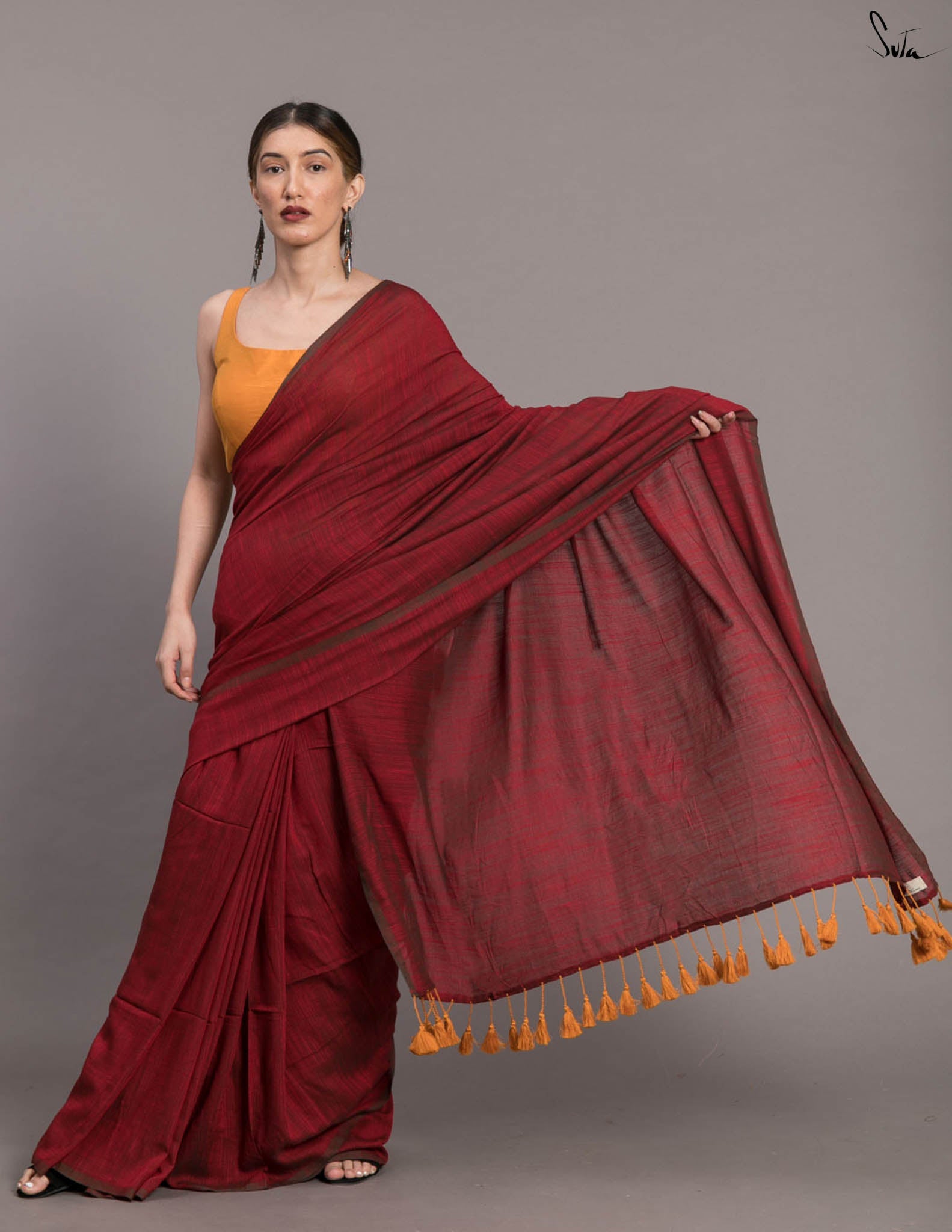 Suta Maroon Solid Cotton Blend Saree
